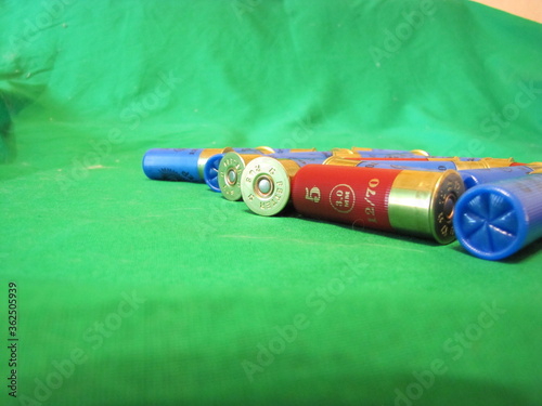 shotgun cartridges 12 gauge on a monotonous background