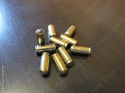 9mm bullets in bulk on a black background