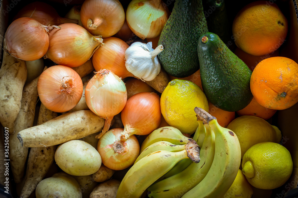 A closeup of a box of freshly delivered, organic vegetables and fruits. More people are turning to home delivery during the coronavirus pandemic. 