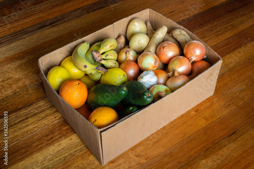 A box of freshly delivered, organic vegetables and fruits. More people are turning to home delivery during the coronavirus pandemic. 