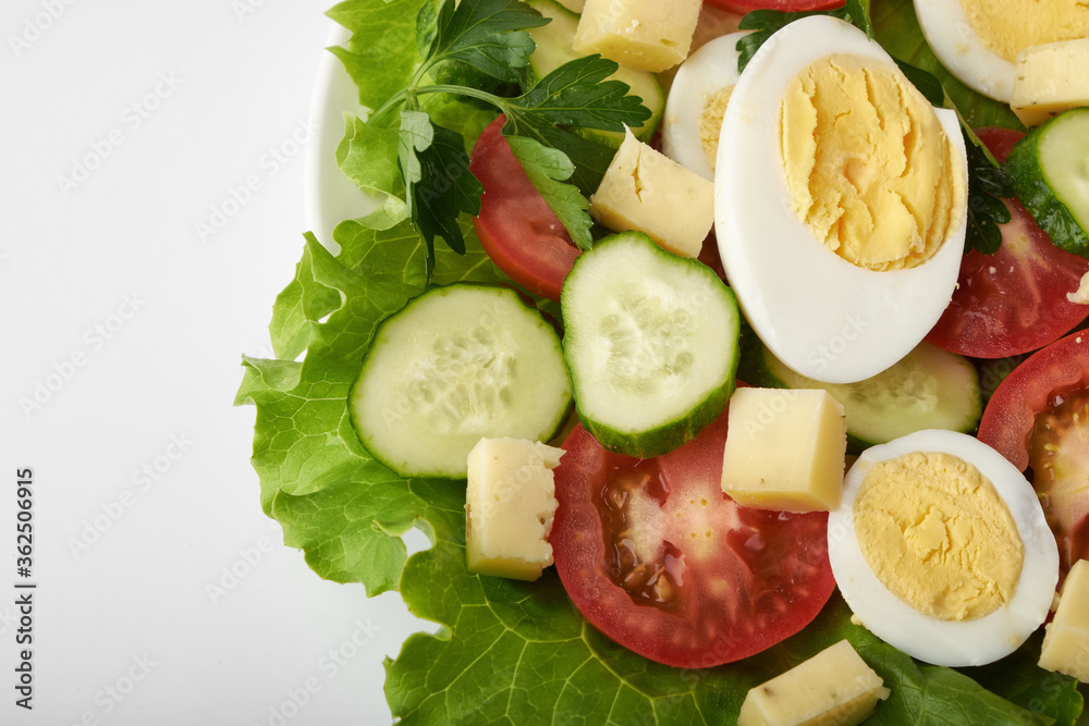 healthy food, cabbage salad with tomatoes, egg and cheese. healthy food, cabbage salad with tomatoes, egg and cheese.
