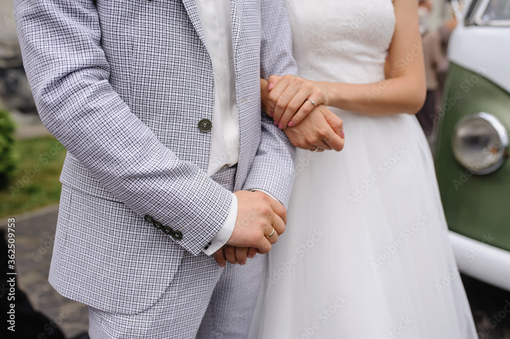 Overstretched hands of the bride and groom.... Overstretched hands of the bride and groom....