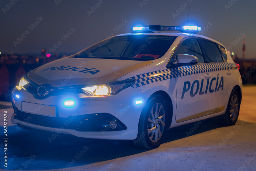 police car with the city in the background police car with the city in the background