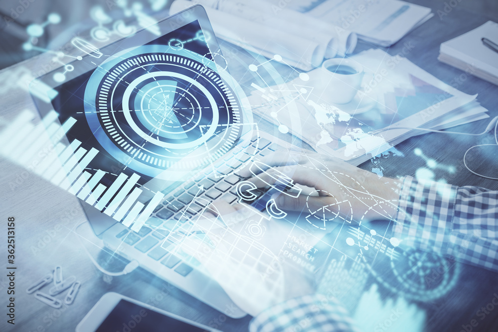 Multi exposure of businessman working on laptop on background. International business hologram in front. Concept of success. Multi exposure of businessman working on laptop on background. International business hologram in front. Concept of success.