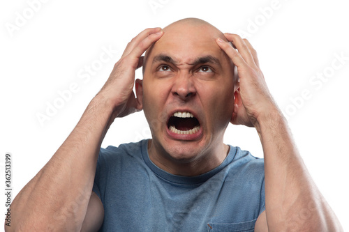 Photos Photo of young bald angry screaming man