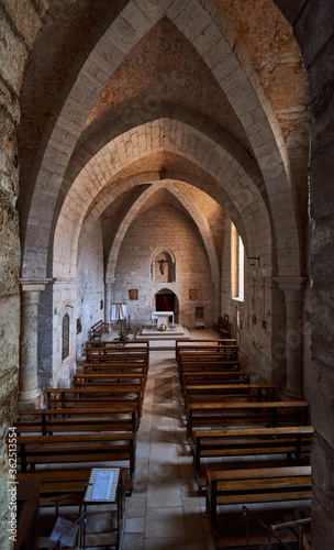 Interior of a medieval church with the altar in the background