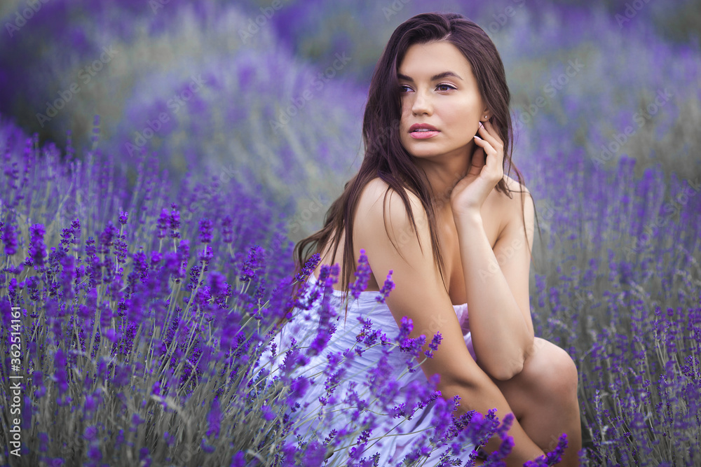 Close up portrait of beautiful young woman in lavender field. Close up portrait of beautiful young woman in lavender field.