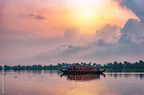 Canvas-taulu A well decorated houseboat carrying tourists around via backwate