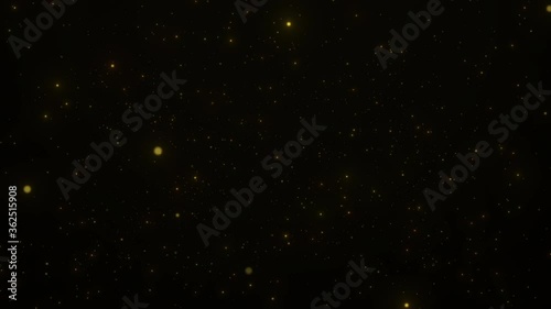 Gold glittering star light and bokeh floating on back background.