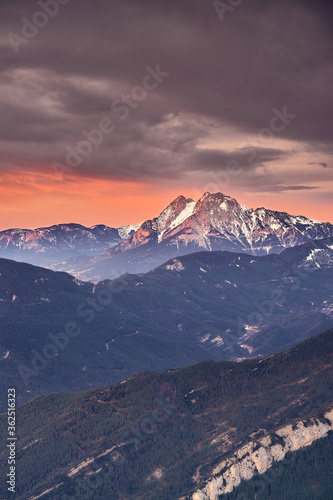 Sunrise on top of a snowy mountain