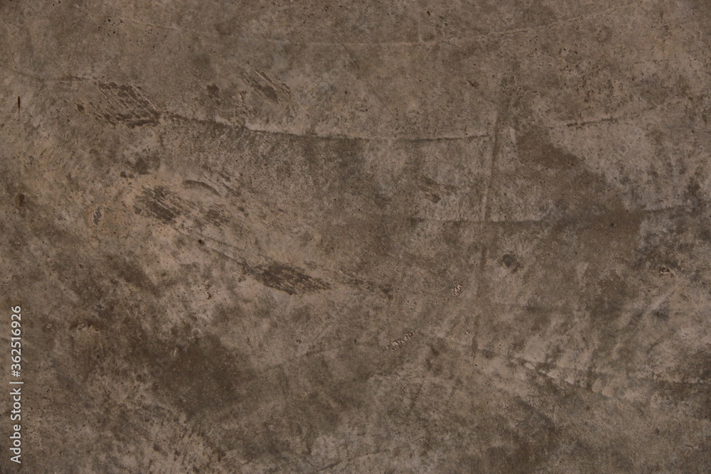 Naklejka premium fondo abstracto con manchas grises sobre suelo de cemento