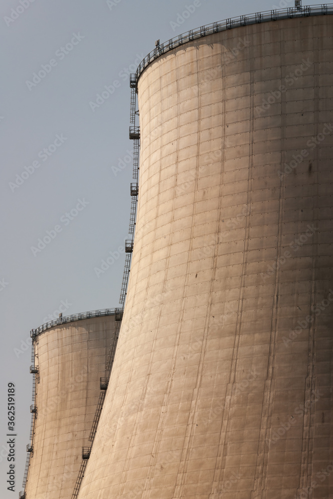 Cooling towers of power plant with stairs to reach the top Cooling towers of power plant with stairs to reach the top