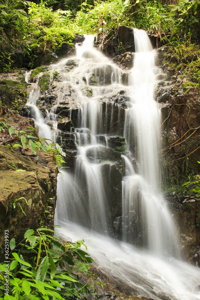 Obraz premium Ton Sai Waterfall in National Park Khao phra thaeo, Phuket, Thailand, Asia