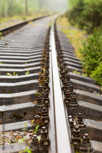 Railways close-up. Modern railway track details. Selective focus