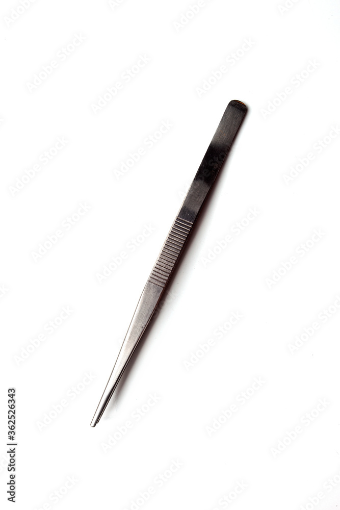 Different goldsmiths tools on the jewelry workplace. Craft jewelry making with professional tools. Set of tools over white background. Different goldsmiths tools on the jewelry workplace. Craft jewelry making with professional tools. Set of tools over white background.