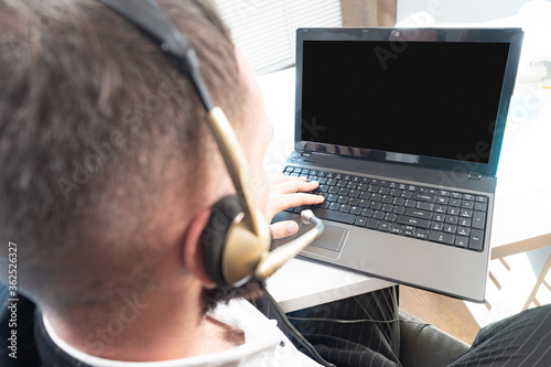 Telemarketer in call center...