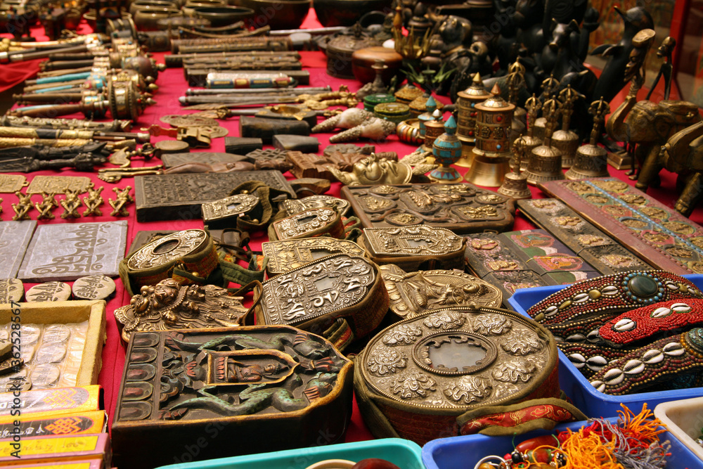 Tibetan praying objects. Spiritual quotation is written on all religious objects