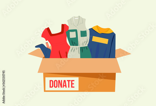 Vector cloth donation box with different clothes