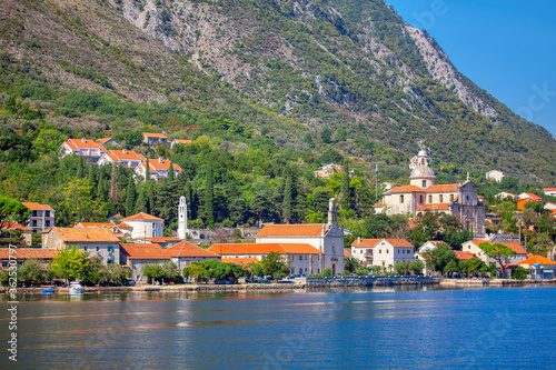 Old coastal town in Kotor Bay from Montenegro . View of medieval churches 