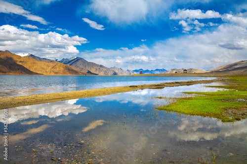 Fototapeta Naklejka Na Ścianę i Meble -  Landscape with reflections of the mountains on the lake named Pagong Tso, situated on the border with India and China.