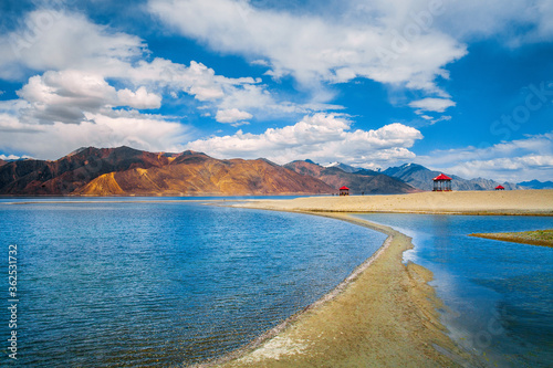 Landscape with reflections of the mountains on the lake named Pagong Tso, situated on the border with India and China.