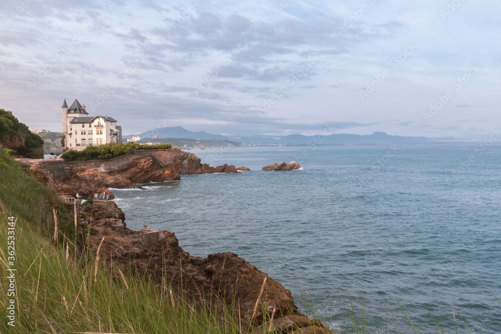 Biarritz, France. Panoramic view of the ocean, coastline, Villa Belza (built in19th century) and city skyline. Biarritz, France. Panoramic view of the ocean, coastline, Villa Belza (built in19th century) and city skyline.