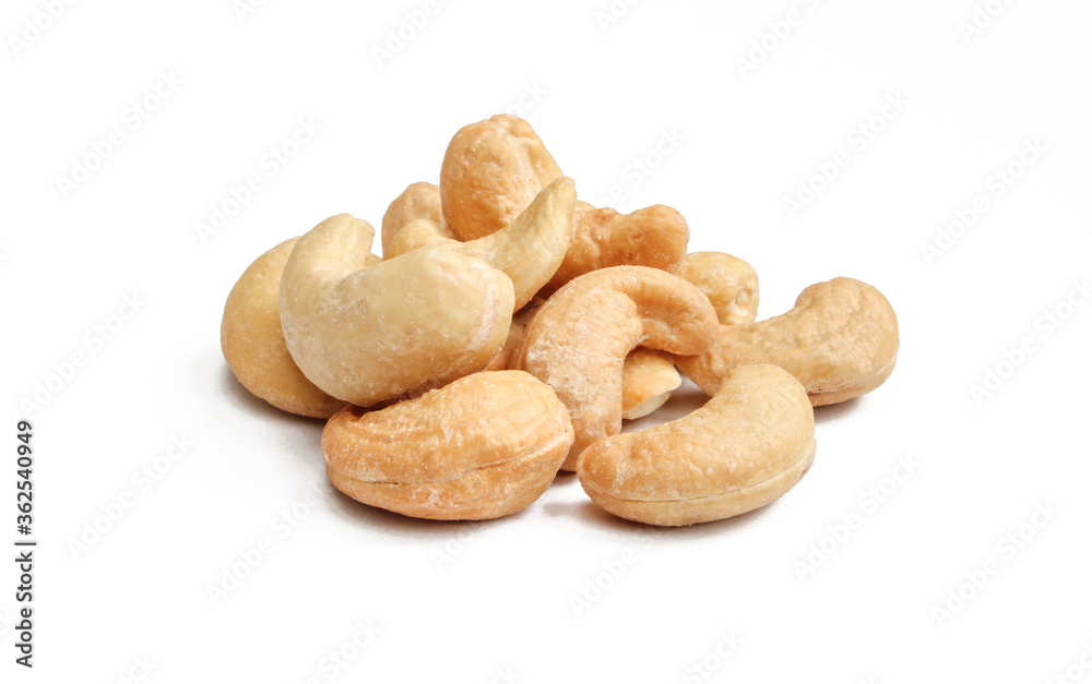 Pile of delicious brown Cashew nuts isolated on white background. Pile of delicious brown Cashew nuts isolated on white background.
