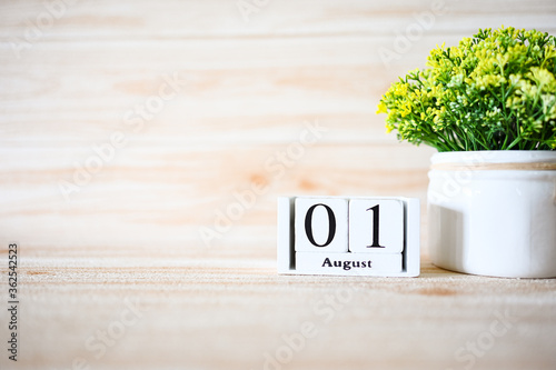 01 August Wooden calendar with Concept Start Hello August