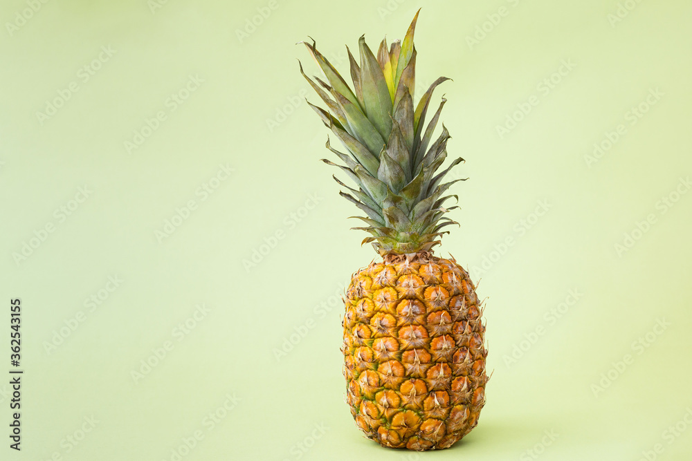 Pineapple green background. Close up. Copy space