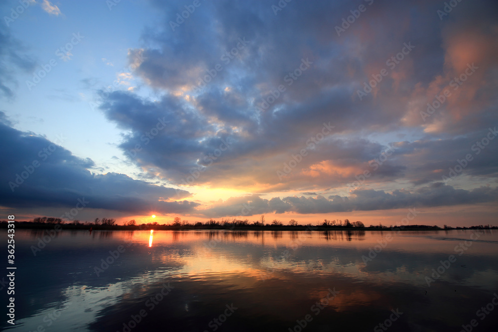 Colorful sunset by the Odra River, Poland. Colorful sunset by the Odra River, Poland.