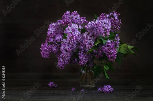 Still-life. Lilac Bouquet on the table.