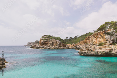 Bay at the cliffs with azure blue water. Mediterranean Sea, beautiful nature. 