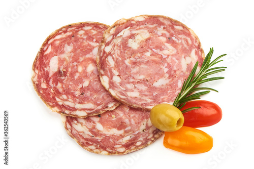 Salami Traditional Smoked slices with herbs, isolated on a white background. Top view