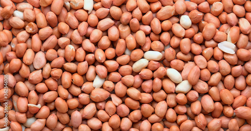 Top view of Raw Peanuts background. Pile of raw peanuts beans texture. 