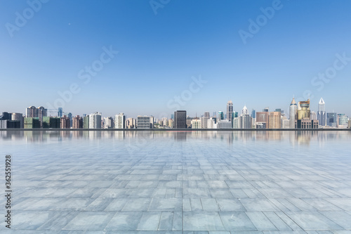 Fototapeta Naklejka Na Ścianę i Meble -  modern city skyline with empty square floor
