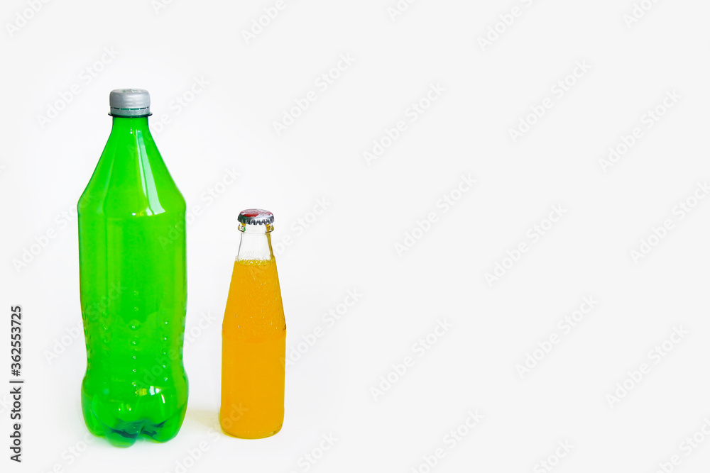 green and orange beverage a bottle green and orange beverage a bottle