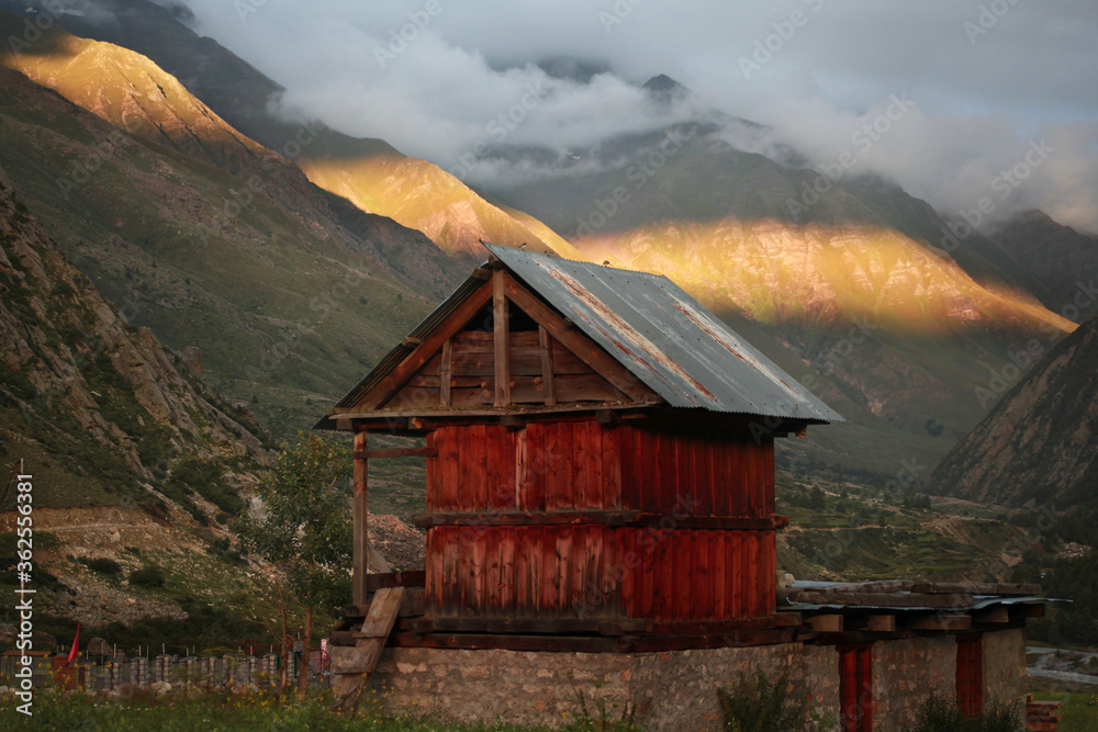 Sun beam of light on mountain in the evening at Chitkul Himachal