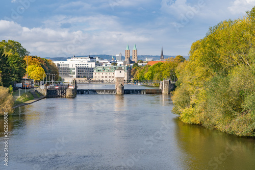 View over the river Fulda with its lock to the city center of Kassel, Germany, on a sunny autumn day