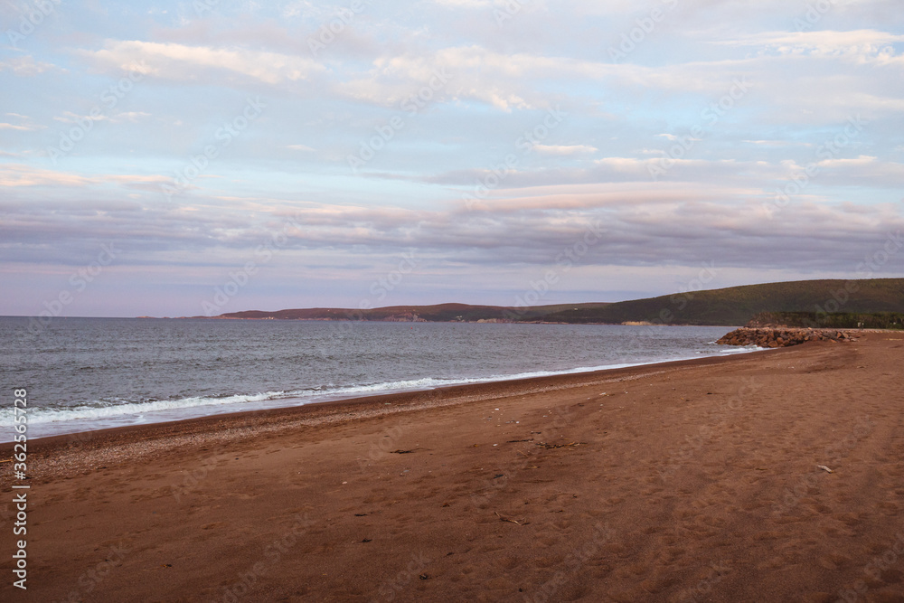 The view from the beach on beautiful sunset on Cape Breton Island