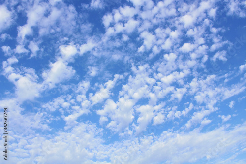 Beautiful blue sky and white cirrus clouds. Background. Landscape.