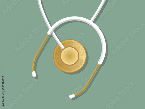 Golden stethoscope on green background