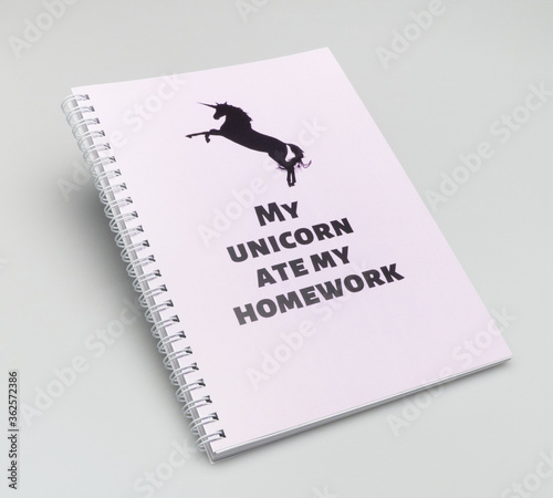 notepad cover with a Unicorn symbol on a white background