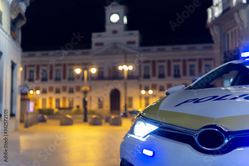 police car with the city of madrid in the background © Aitana fotografia