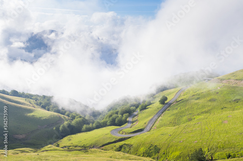 aerial view of countryside road at mountains