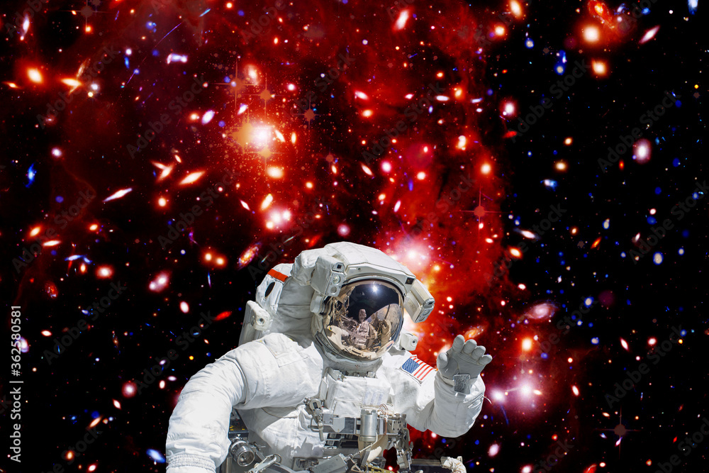 Astronaut against deep space. The elements of this image furnished by NASA. Astronaut against deep space. The elements of this image furnished by NASA.