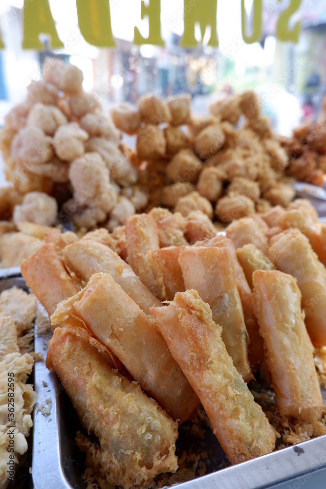 Gorengan is a typical snack from Indonesia. Usually consists of tempeh, tofu, cassava, or bananas. This food is usually sold by street vendors at cheap prices. Gorengan is a typical snack from Indonesia. Usually consists of tempeh, tofu, cassava, or bananas. This food is usually sold by street vendors at cheap prices.