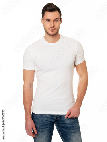 The young man in a white t-shirt on a white background. Template of a white t-shirt. Front view