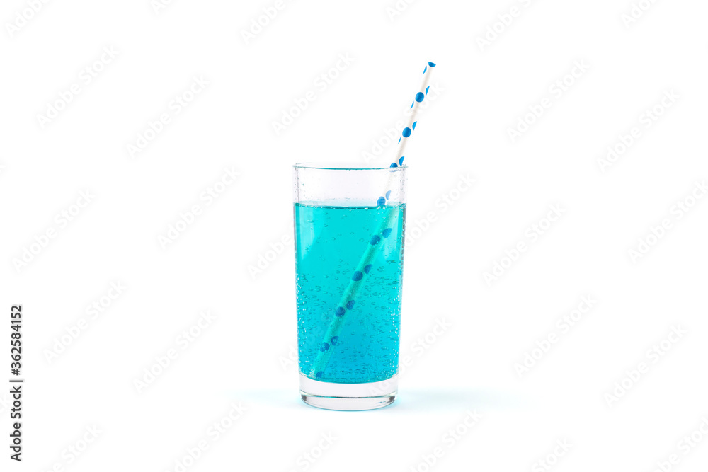 Blue lemonade with gas bubbles and a cocktail straw isolated on white background. Blue lemonade with gas bubbles and a cocktail straw isolated on white background.