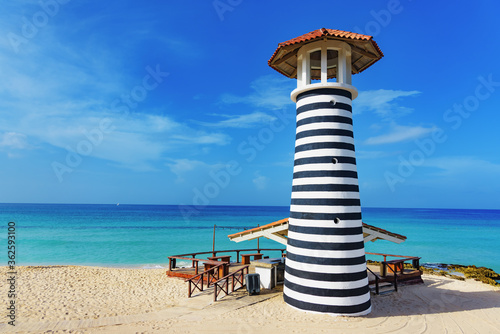 Fototapeta Naklejka Na Ścianę i Meble -  striped lighthouse on the caribbean