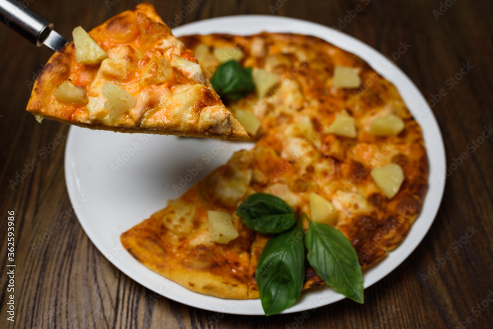 pizza with meat and tomatoes under cheese
pizza with meat and tomatoes under cheese